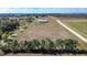 Aerial view showing a large tract of land with great potential for development or agricultural use at 1815 Adams Barn Rd, Lake Alfred, FL 33850
