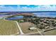 An aerial showing land in a tranquil setting with mature trees, ideal for a custom home or development at 1815 Adams Barn Rd, Lake Alfred, FL 33850