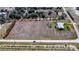 Large parcel, bordered by roads and citrus groves, offering ample space and development potential at 1815 Adams Barn Rd, Lake Alfred, FL 33850