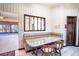 Charming breakfast nook with built-in seating and granite top table at 1815 Adams Barn Rd, Lake Alfred, FL 33850