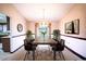 Traditional dining room with chandelier and seating for eight at 1815 Adams Barn Rd, Lake Alfred, FL 33850