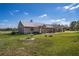 Charming brick home exterior with a beautiful lawn and mature trees at 1815 Adams Barn Rd, Lake Alfred, FL 33850