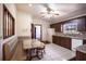 Cozy kitchen featuring built in breakfast nook, stainless appliances, and ample storage at 1815 Adams Barn Rd, Lake Alfred, FL 33850