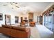 Open living room with fireplace and plenty of light at 1815 Adams Barn Rd, Lake Alfred, FL 33850