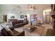 Cozy living room with comfortable seating and fireplace at 1815 Adams Barn Rd, Lake Alfred, FL 33850