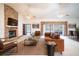 Large living room with fireplace and sliding glass doors at 1815 Adams Barn Rd, Lake Alfred, FL 33850