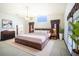 Open bedroom with natural light and en-suite bathroom at 1815 Adams Barn Rd, Lake Alfred, FL 33850
