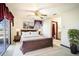 Spacious bedroom with balcony access and en-suite bathroom at 1815 Adams Barn Rd, Lake Alfred, FL 33850