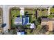 Aerial view of a home with a pool, fenced yard, driveway and mature landscaping at 1817 Mckeown Ave, Haines City, FL 33844