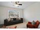 Inviting living room with a large window, plush seating, and plenty of natural light at 1817 Mckeown Ave, Haines City, FL 33844