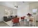 Bright and airy living room featuring comfortable seating, a dining area, and stylish decor at 1817 Mckeown Ave, Haines City, FL 33844