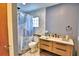 View of bathroom featuring tiled shower, flooring and modern vanity with sink at 20 24Th Sw St, Winter Haven, FL 33880