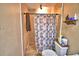 View of the bathroom featuring stand-up shower with tiled walls and floors at 20 24Th Sw St, Winter Haven, FL 33880