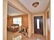 Inviting entryway with tile floors and a view into the living room at 20 24Th Sw St, Winter Haven, FL 33880