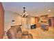 Spacious open-concept living area with tile flooring and ample natural light at 20 24Th Sw St, Winter Haven, FL 33880