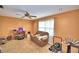 Bright and airy living room with tile floors and neutral walls at 20 24Th Sw St, Winter Haven, FL 33880