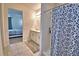 Bathroom featuring a tile floor, shower with patterned curtain, and vanity with sink at 200 Summershore Dr, Auburndale, FL 33823