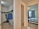 Hallway with closet, doorway, and view of the bedroom at 200 Summershore Dr, Auburndale, FL 33823