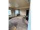 Large living room with big window showing great potential for updates at 216 Dorsett Ave, Lake Wales, FL 33853