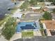 Waterfront home with a dock, solar panels, sandy beach, and a well maintained yard at 253 Blackwell Villa Cv, Babson Park, FL 33827