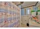 Bathroom featuring blue walls, tile floors, and a shower with a beach-themed curtain at 253 Blackwell Villa Cv, Babson Park, FL 33827