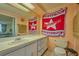 Bathroom with a vanity, mirror, and toilet at 253 Blackwell Villa Cv, Babson Park, FL 33827