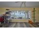 A bonus room with luxury vinyl plank flooring and a large water view at 253 Blackwell Villa Cv, Babson Park, FL 33827