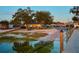 View of the waterfront featuring a boat ramp, dock, and serene water views at 253 Blackwell Villa Cv, Babson Park, FL 33827