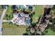 Aerial view of the property showing the large lot, landscaping, and waterfront at 3312 Eagles Trce, Winter Haven, FL 33884