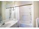 Clean bathroom featuring a shower/tub combo and vanity with lots of counter space at 3312 Eagles Trce, Winter Haven, FL 33884