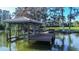 Private dock on the water, offering scenic views and waterfront access at 3312 Eagles Trce, Winter Haven, FL 33884