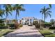 Beautiful home with mature landscaping, circular driveway, and a grand entrance at 3312 Eagles Trce, Winter Haven, FL 33884