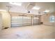 Spacious three car garage with ample lighting at 3312 Eagles Trce, Winter Haven, FL 33884