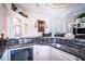 Kitchen bar top with kitchen sink, wine cooler, and island seating at 3312 Eagles Trce, Winter Haven, FL 33884