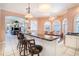Open concept kitchen with breakfast bar, dining area, and scenic views at 3312 Eagles Trce, Winter Haven, FL 33884