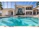 Luxury pool and spa, with an expansive backyard that offer a private, resort-like experience at 3312 Eagles Trce, Winter Haven, FL 33884