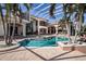 Beautiful screened pool with palm trees and plenty of space for relaxation and enjoyment at 3312 Eagles Trce, Winter Haven, FL 33884