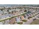 Well-kept home situated in a vibrant community, with a picturesque pond and manicured lawns at 3418 Raleigh Dr, Winter Haven, FL 33884