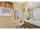 Bathroom with a window and a large mirror at 3418 Raleigh Dr, Winter Haven, FL 33884