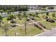 Beautifully landscaped community park featuring walking paths, benches, and manicured greenery at 3418 Raleigh Dr, Winter Haven, FL 33884