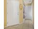 Bright entryway with tile flooring and a view of the interior doors and hallway at 3418 Raleigh Dr, Winter Haven, FL 33884