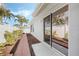 Exterior of a home with manicured landscaping, a walkway, and a screened lanai at 3418 Raleigh Dr, Winter Haven, FL 33884
