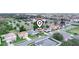 A beautiful aerial view of a suburban neighborhood with well-maintained lawns at 3526 Warbler Way, Kissimmee, FL 34746