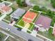 A drone's view shows property lines, neighboring homes and their landscaping at 3526 Warbler Way, Kissimmee, FL 34746