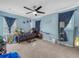 Themed bedroom with carpet, fan, and celestial decor for a  at 3526 Warbler Way, Kissimmee, FL 34746