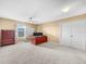 Bedroom with a ceiling fan, white board, desk, and an antique chest of drawers at 3526 Warbler Way, Kissimmee, FL 34746