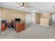 This bonus room features carpet floors, neutral walls, and a desk at 3526 Warbler Way, Kissimmee, FL 34746