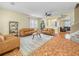 Inviting living room with stylish leather sofas and an open layout at 3526 Warbler Way, Kissimmee, FL 34746