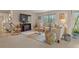 Inviting living room with fireplace, tile floor, and comfortable seating arrangements at 400 El Camino Dr # 101, Winter Haven, FL 33884
