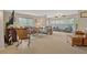 Open living room featuring tile floors, comfortable seating, and lots of natural light at 400 El Camino Dr # 101, Winter Haven, FL 33884